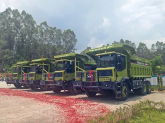 Successful Delivery | Four NKE90D Electric Wide-Body Dump Trucks Delivered to Yingde Longshan Cement for Green Upgrade